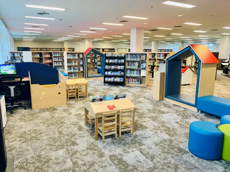 Welcome to Your Library: Image of colorful shelving and furniture in the Camp Foster Library Children&#039;s Area, Okinawa, Japan.